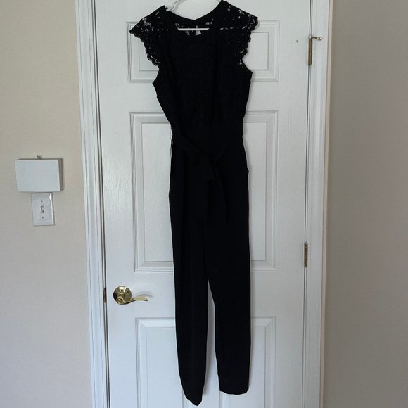 bebe Pants - Bebe black jumpsuit with lace US size 4